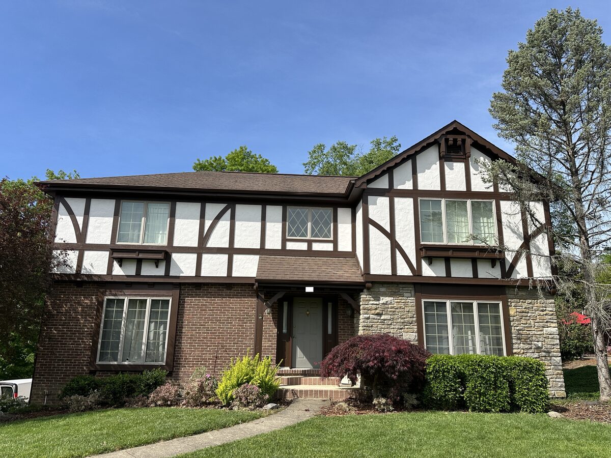 Exterior Tudor home painting